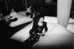 Constance lounging in tent at Whitney's party.