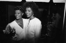 Singer Dionne Warwick and Whitney Houston at Whitney's 26th birthday bash.